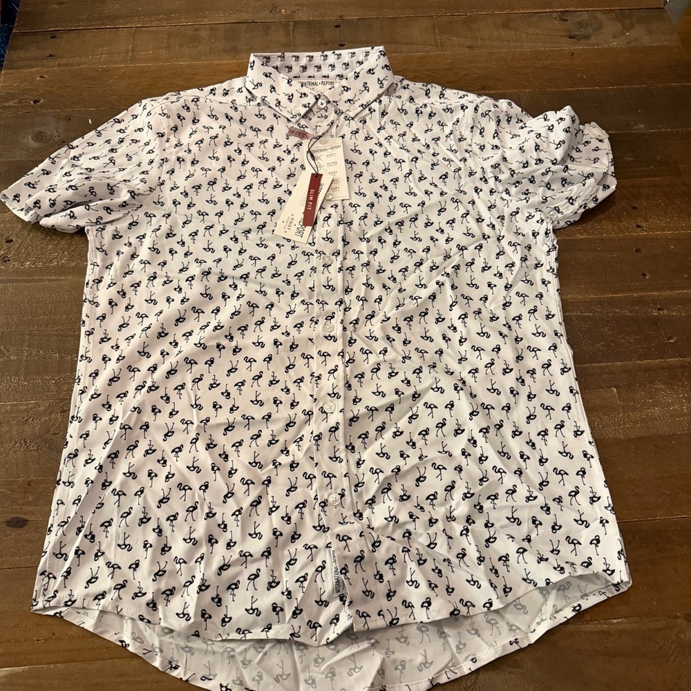 International Report White Short Sleeve performance Shirt with Black Pattern